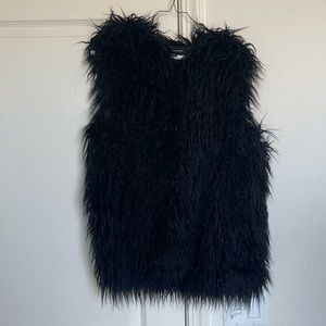 Black faux fur vest